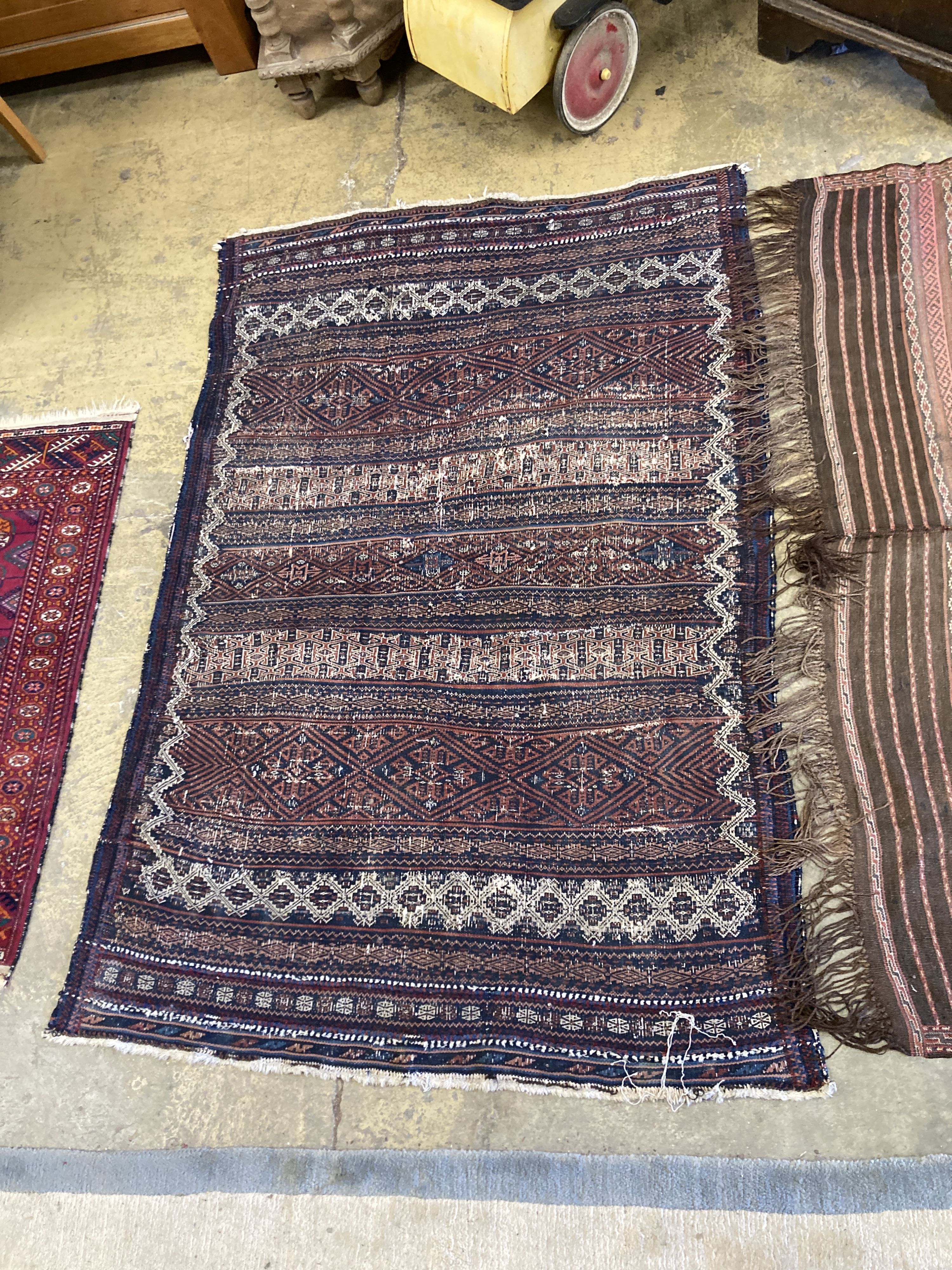 Two early 20th century flatweave rugs, a Bokhara rug and a Belouch rug, largest 220 x 160cm